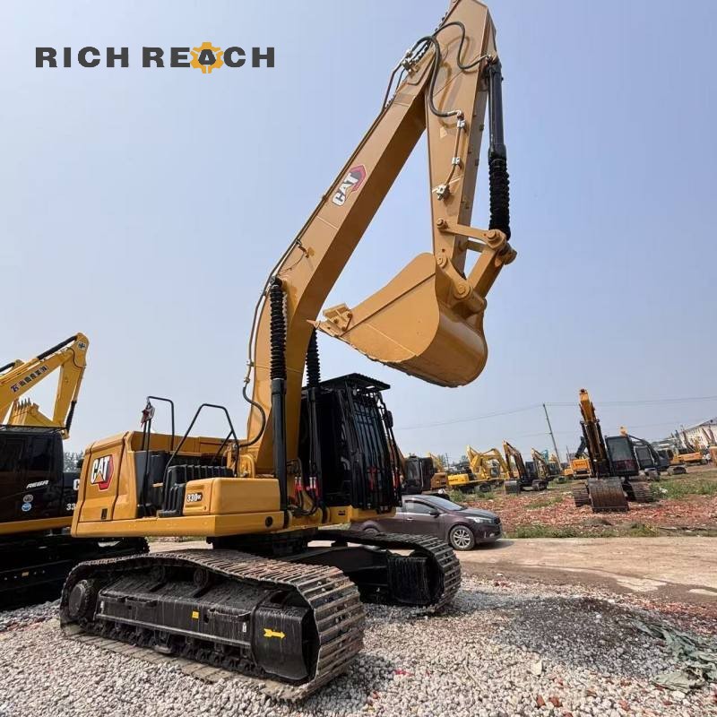Rear view of a 2021 Caterpillar 330GC excavator, listed at $79,167 for sale